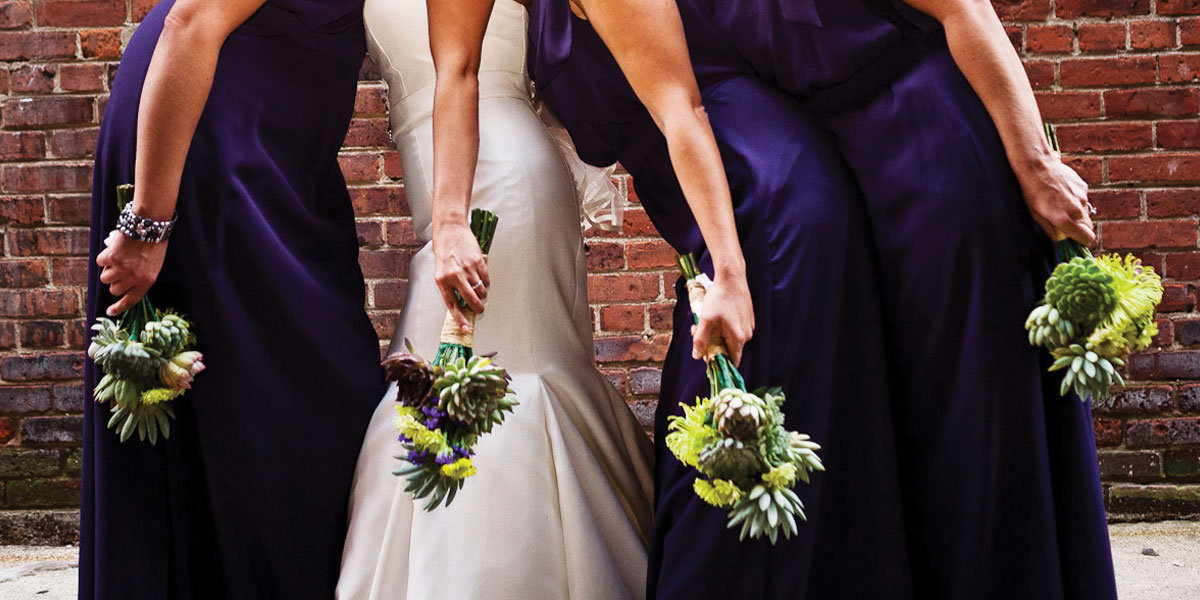 The bridesmaids wore a beautiful Lapis purple dress Priscilla of Boston 